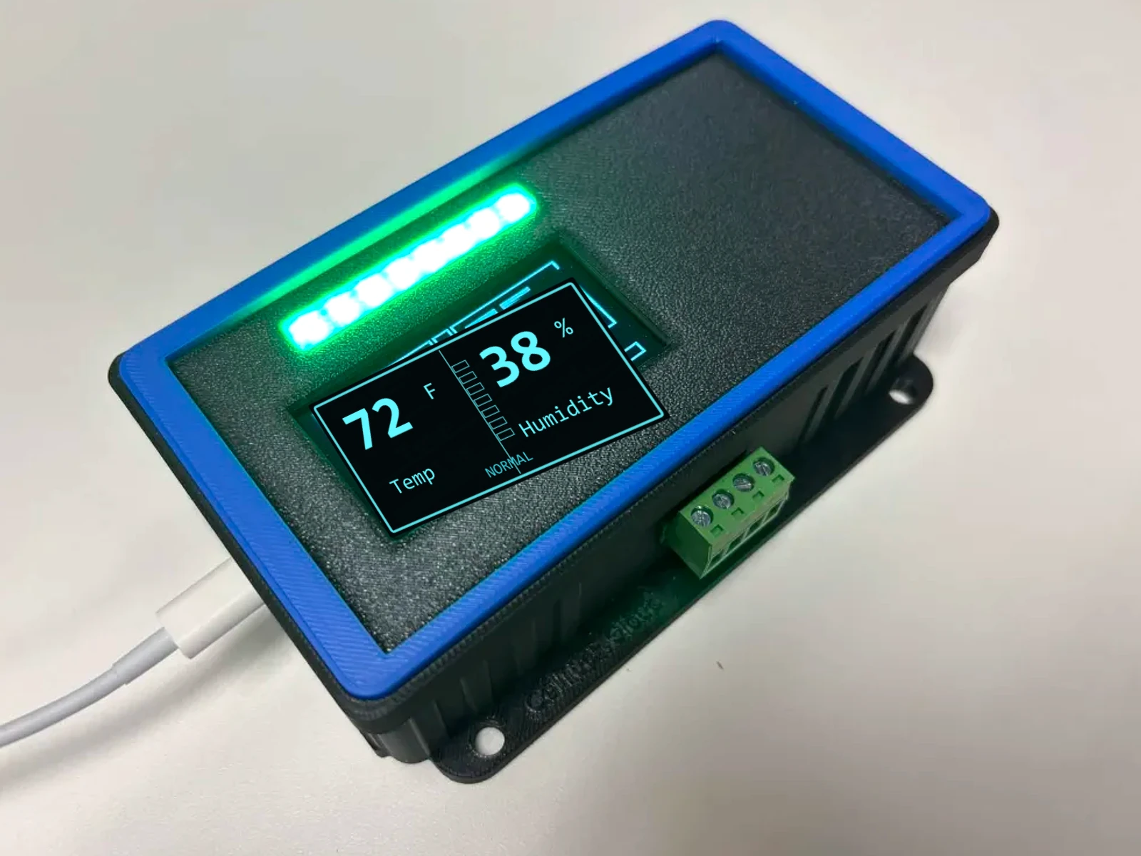 Building Sensor angled view with clean OLED display